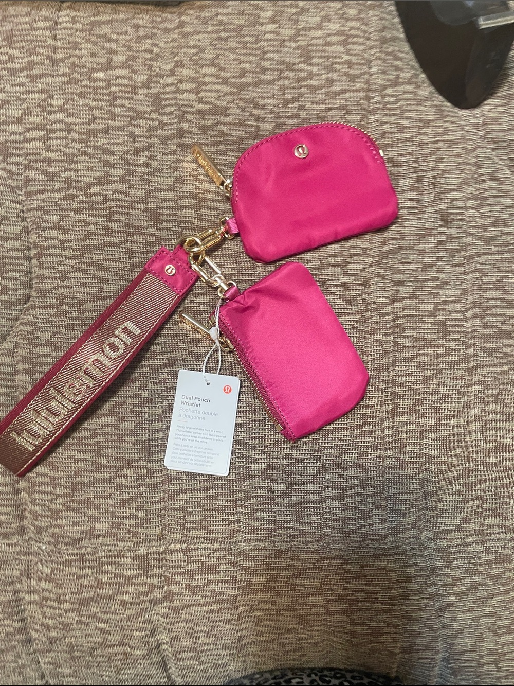 lululemon athletica pink dual pouch wristlet with logo strap